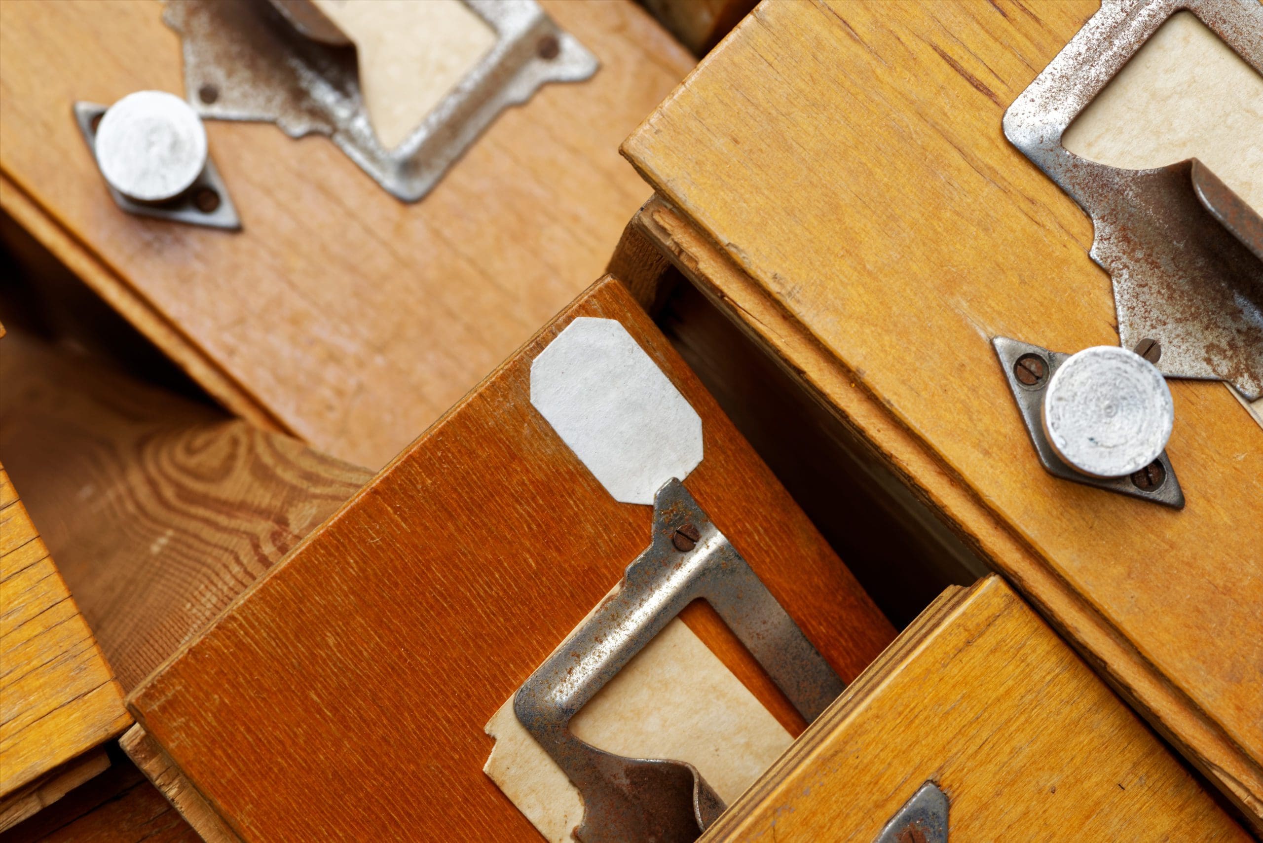 Disorderly group of old wooden drawers